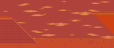 A cliff overlooking the water bathed in sunset orange. There is also a staircase opposite to it, leading up out of the water