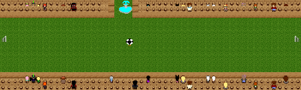 A football field surrounded by stands full of people. There is an out of place fountain interrupting the middle of the stands. there is a football with legs standing in the middle of the field.